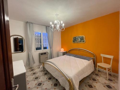Un pat sau paturi într-o cameră la Cà di Lucca