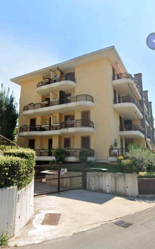 a large apartment building with balconies on it at Casa Lella 7 Marino in Marino
