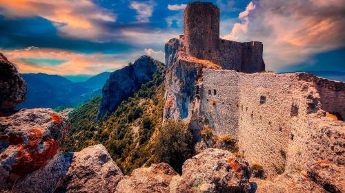 an old castle on top of a mountain at Lalagunebages, Panoramic View in Bages