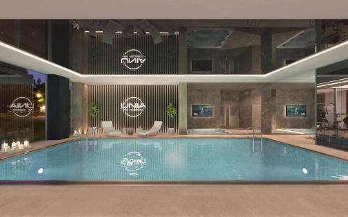 a large swimming pool in a large building at APARTAMENTY ARTE LUBLIN Unia Art Residence 121- faktura VAT garaż in Lublin