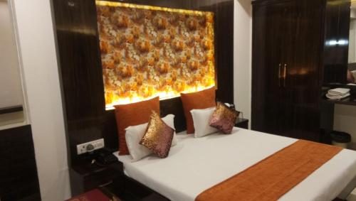 Posteľ alebo postele v izbe v ubytovaní Hotel Banjara