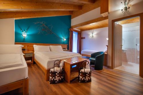 Postel nebo postele na pokoji v ubytování Hotel Primula