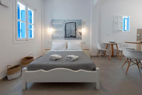 Кровать или кровати в номере White and Grey Chora