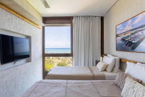 Postel nebo postele na pokoji v ubytování Casa na rota dos milagres com uma vista incrível!