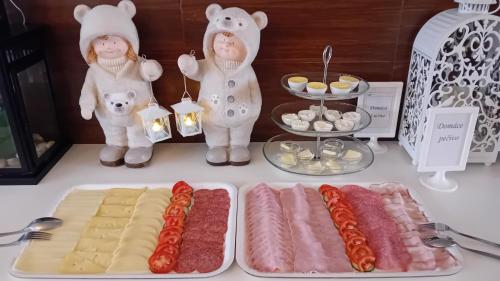 a group of food items on top of a table at Penzión Vilka Podhájčanka in Podhájska