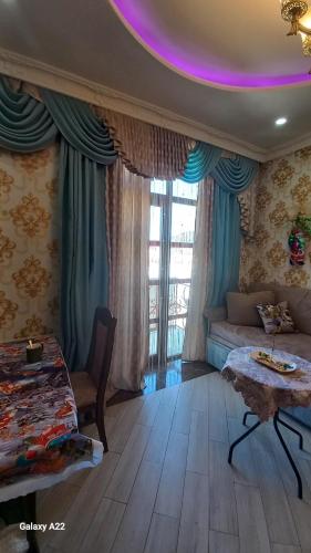 Χώρος καθιστικού στο 1 Room Deluxe Apartment in Bakuriani