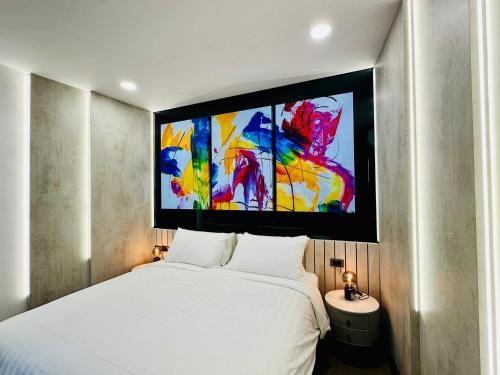 En eller flere senge i et værelse på 水秀一方Sun Moon Lakeside Boutique Hotel