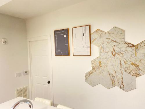 a bathroom with a map on the wall at Cozy apt with great city view in Union City