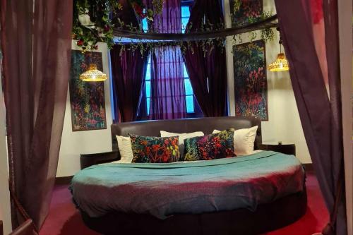 Postel nebo postele na pokoji v ubytování Hotel Pelirocco