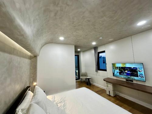 Et tv og/eller underholdning på 水秀一方Sun Moon Lakeside Boutique Hotel