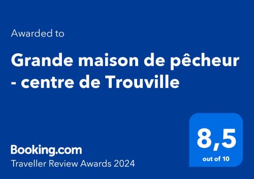 Ett certifikat, pris eller annat dokument som visas upp på Grande maison de pêcheur - centre de Trouville