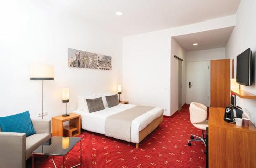 Et tv og/eller underholdning på Leonardo Hotel Berlin KU'DAMM