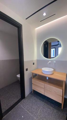 a bathroom with a sink and a mirror at Athens Tower in Athens