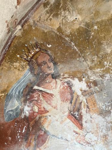 a painting of a man with a crown on his head at Palazzo Prence in Copertino