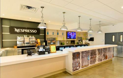 a nesco store with a counter in a store at Pool - WiFi - Parking - Best Location ! in Kissimmee