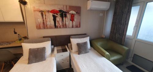 Postel nebo postele na pokoji v ubytování Aparthotel - SAVAS 1 - Mini Studio & Parking