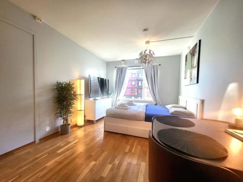 Ένα ή περισσότερα κρεβάτια σε δωμάτιο στο Moon apartment near the Centre ! Free parking available !