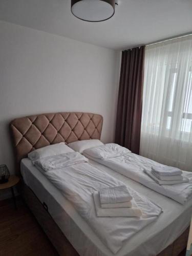 Katil atau katil-katil dalam bilik di Apartment Halilovic L2-18