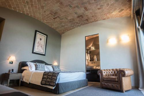 Letto o letti in una camera di Relais San Maurizio