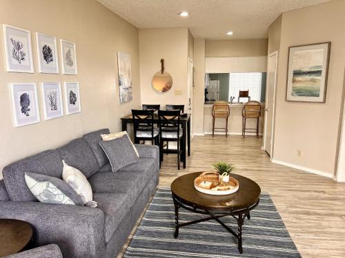 a living room with a couch and a table at Toes In The Water II in Padre Island
