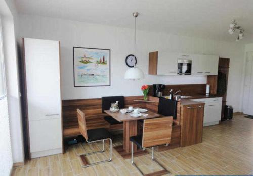 Kuchyň nebo kuchyňský kout v ubytování Küstenwald - Ferienwohnung Igelring H