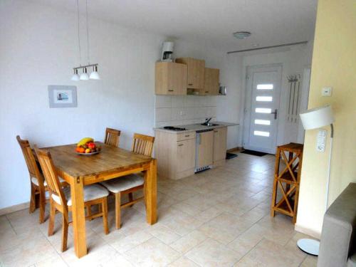 Kuchyň nebo kuchyňský kout v ubytování Küstenwald - Ferienwohnung Igelring J56