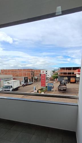 a view of a parking lot from a window at RADAR PÁLACE HOTEL in Caculé