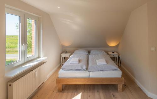 Ferienwohnung Wattlaeufer tesisinde bir odada yatak veya yataklar