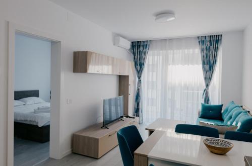 Ένα ή περισσότερα κρεβάτια σε δωμάτιο στο Royal Blue Property