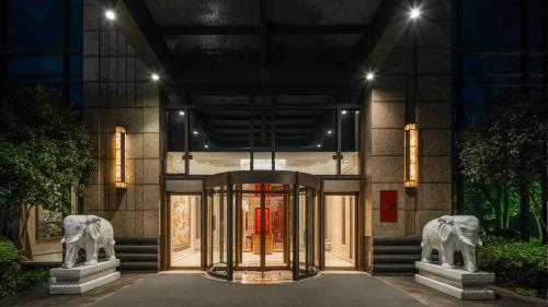a entrance to a building with a revolving door at InterContinental Changzhou by IHG in Changzhou