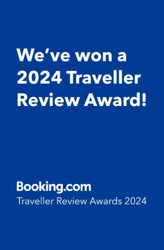 a blue sign that says weve won a traveler review award at Blue River in Rovaniemi