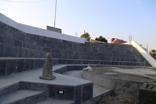 a statue sitting on top of some stairs at Suryaansh in Pālghar