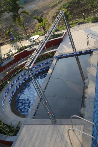 an overhead view of a swimming pool at Suryaansh in Pālghar