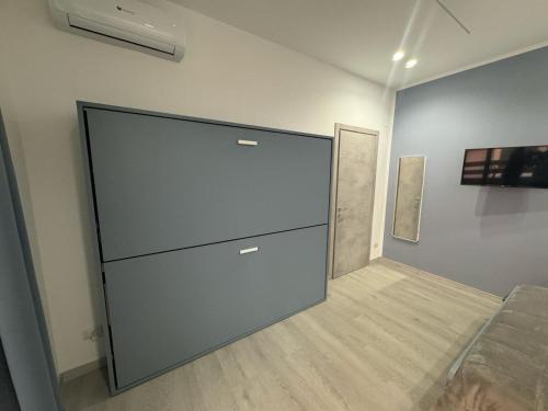 a large sliding glass door in a room at Cliò guest house in Ercolano