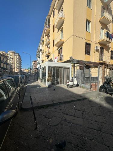 a building on the side of a city street at Cliò guest house in Ercolano