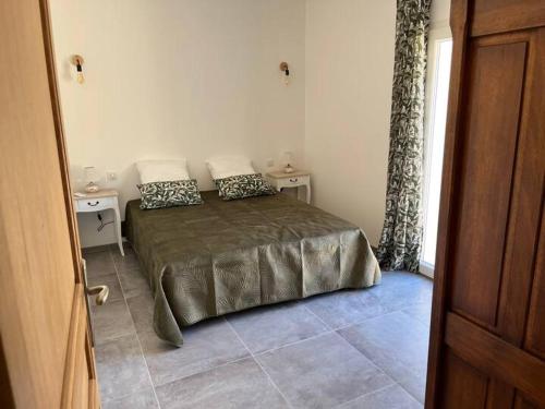 Postel nebo postele na pokoji v ubytování Bastide Provencale