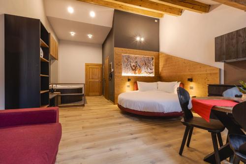 Postel nebo postele na pokoji v ubytování Granduca Mountain Wellness Apartments Campigna
