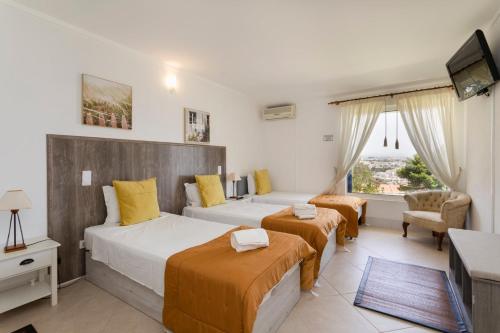 Voodi või voodid majutusasutuse The Albufeira Concierge - Moinho Sea Views & Pool toas
