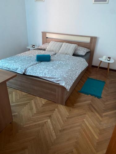 a bedroom with a bed with a blue mattress at Apartment Niko in Split