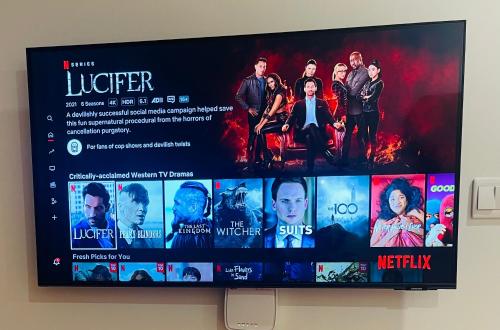 a flat screen tv with a movie on it at Căn hộ studio Vinhome grand park Quận 9 in Long Bình