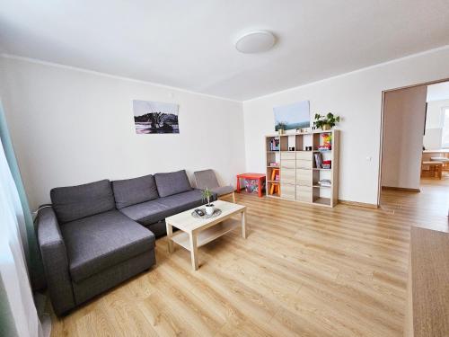 Een zitgedeelte bij UrboRent 2 kambarių butas Anykščiuose 2 rooms apartment