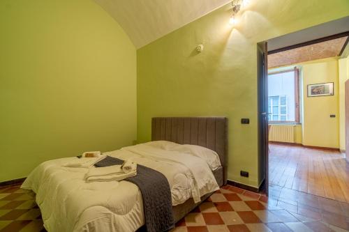 Una cama o camas en una habitación de Casa Dei GIRAMONDO