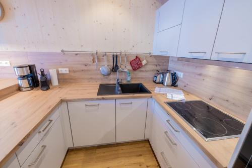 Una cocina o zona de cocina en Woody Park
