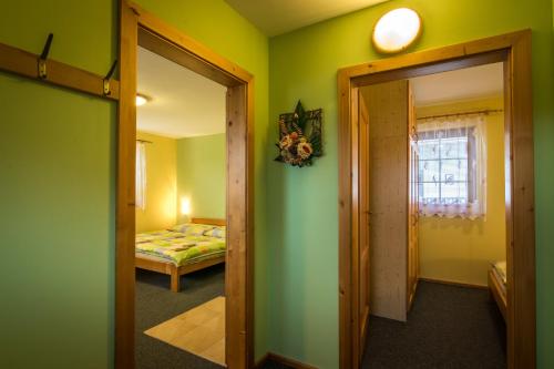 Ένα ή περισσότερα κρεβάτια σε δωμάτιο στο Ada Apartments
