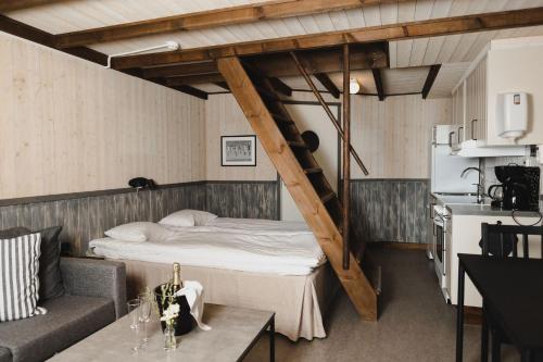 Postel nebo postele na pokoji v ubytování Epokgården