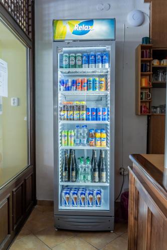 a refrigerator filled with lots of water and sodas at Penzion U rybníka in Šumperk