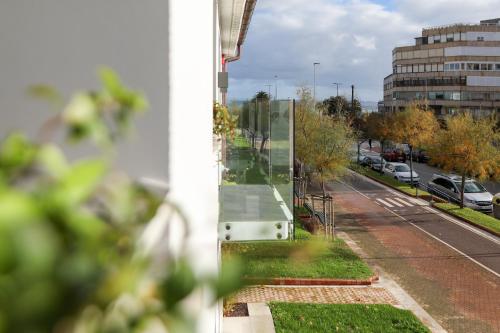 a mirror on the side of a building at Le Petit Boutique Hotel in Santander