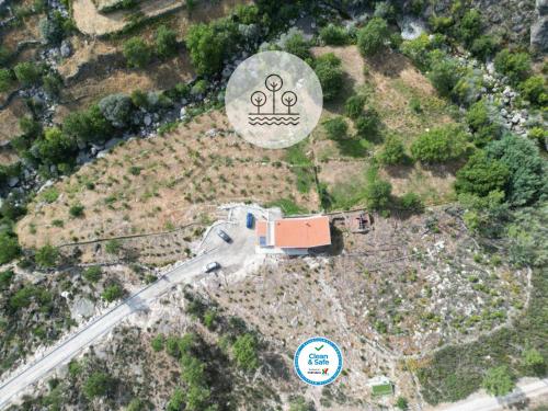 an overhead view of a road with the olympics on it at Hortelã da Ribeira - Serra da Estrela in Cortes do Meio