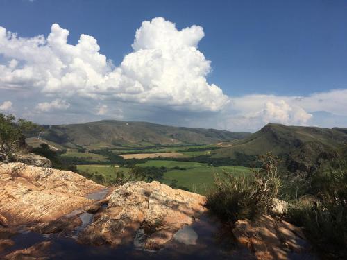 a view from the top of a mountain at Pousada Lobo Guará in São João Batista do Glória