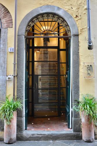 an entrance to a building with a glass door at Antica Residenza Dell'Angelo in Lucca